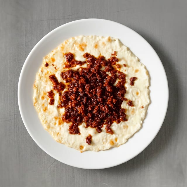 Lunch Queso Derretido con Chorizo.